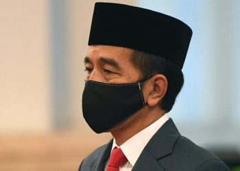 Motif politik dan ekonomi di balik ngototnya Jokowi mengadakan pilkada di tengah pandemi