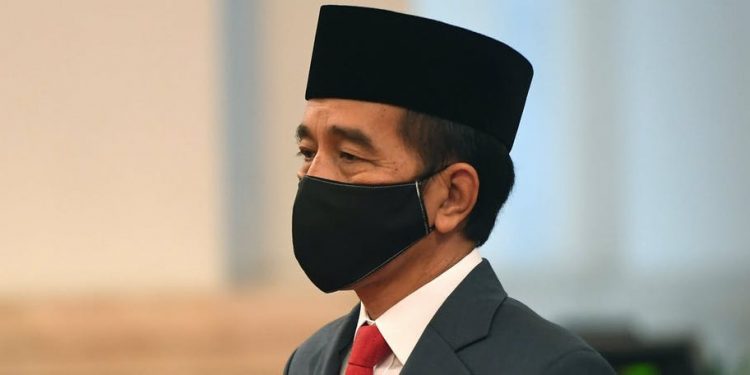 Motif politik dan ekonomi di balik ngototnya Jokowi mengadakan pilkada di tengah pandemi